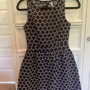 Navy dot cocktail dress; open back